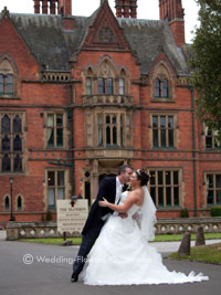 bride and groom at a real wedding outside wroxall abbey