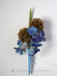 blue hydrangea boutonniere created for a wedding