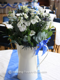 vintage jug with white flowers for blue theme wedding